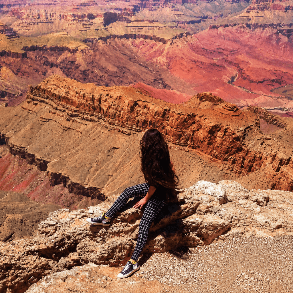 Julia St. John reflecting at the Grand Canyon — founder of Royal Touch Style and creator of the What If Reflection Experience